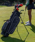 Teen Golf Club Set For Ages 13 To 16 With Driver, Hybrid, 7 PW Irons, Putter, Stand Bag And 3 Headcovers Graphite Woods, Steel Irons, Right Hand Youth Golf Kit Built For Speed, Control, And Confidence on golf course with player putting