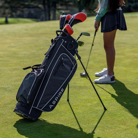Teen Golf Club Set For Ages 13 To 16 With Driver, Hybrid, 7 PW Irons, Putter, Stand Bag And 3 Headcovers Graphite Woods, Steel Irons, Right Hand Youth Golf Kit Built For Speed, Control, And Confidence on golf course with player putting