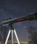 Beginner Friendly 600x50mm Refractor Telescope Kit For Stargazing Folks with aluminum tripod against night sky background