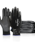 Multi Purpose Light Duty Work Gloves With Palm Coating For Metal Fabrication Machinery And Automotive Jobs Durable PU Palm Grips Like A Pro ANSI EN Abrasion Resistant Size 8 Black Pack Of 12, shown stacked and a single pair upright