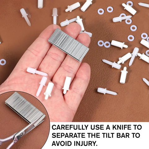 GameChanger Plantation Shutter Repair Kit Features 125 Piece Heavy Duty Louver Staple Set with metal staples and plastic pins in hand.