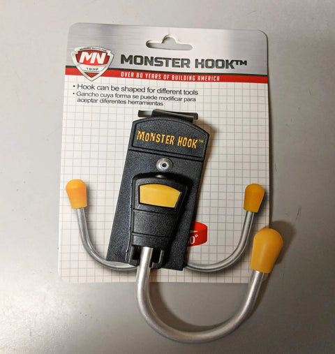 Monster Hook Tool Holder for Cordless Drills, Nail Guns, Saws and More, Yellow and Black Durable Left or Right Hand Mount Rotates 180 Degrees Easy To Install Garage Organizer on packaging.