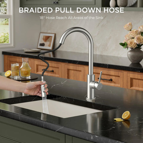 Brushed Nickel Kitchen Faucet With Pull Down Sprayer High Arc Gooseneck Spout Modern Sink Faucet in use on marble countertop