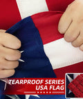 Hands holding durable outdoor American flag 3x5 ft tearproof heavy duty spun polyester with fade resistant color and sewn stripes
