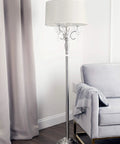 Crystal Silver Floor Lamp Dope 62 Inch Tall With 17 By 17 Inch Base UL Listed 40 Watt Max On Off Switch next to a grey chair