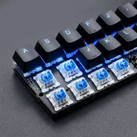 Blue 3-Pin Clicky Mechanical Keyboard Switches 50gf Actuation, Tactile And Audible Feedback, 30-Piece Bulk Pack For DIY Keyboards, Gaming, Typists, And Fidget Enthusiasts shown on hot-swap keyboard plate