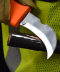 Orange Handle Hawkbill Cable Splicer Skinning Knife With Notched 3 Inch Blade For Easy Stripping of Cable Jackets in use