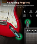 Wireless Guitar System For Electric Guitar And Bass With Rechargeable 2 4GHz Transmitter Receiver in use with guitar and amp