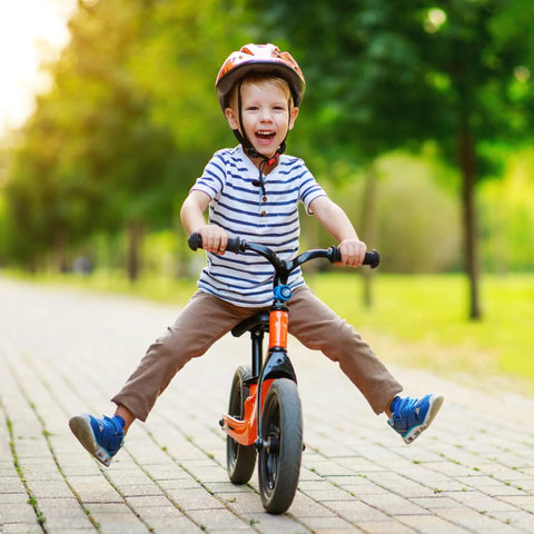 Child riding bike with Kid Friendly Bike Seat Replacement With Post For Boys And Girls Cushioned Comfort Saddle, outdoors