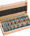 Wooden case containing Forstner Bit Set 5/16 To 2-1/16 Inch, 15-Piece With Hex Shanks For 3/8 Drill Chucks arranged neatly inside.