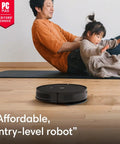 Man and child playing on a wooden floor with Robot Vacuum And Mop Combo With Powerful Suction And Smart Mapping For Multi Surface Floors In One Pass Easy To Use Self Charging Bagless Space Saving Design Cleans In Neat Rows And Edges Great For Pet Hair And Daily Messes in foreground