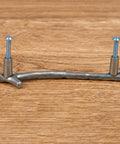 10 Pack Zinc Alloy Twig Branch Cabinet Knob Set In Silver Decorative Pull Handles for cabinets with screws, wood background.