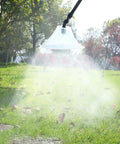 Drift Guard With Flat Sprayer Nozzle For Backpack Sprayers Reduces Fine Droplet Drift With Wind Shield in use on grassy lawn