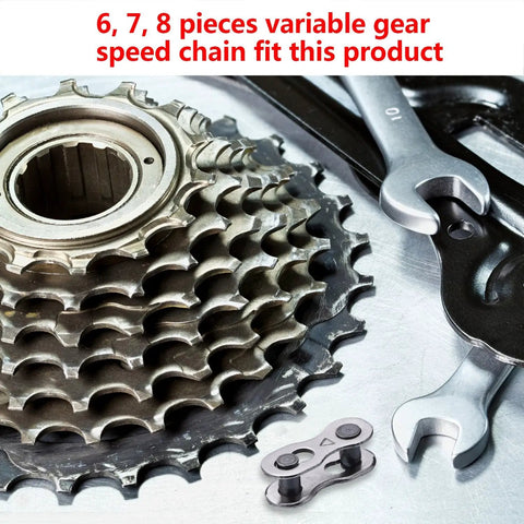 Bicycle gear set with wrenches and 8 Pack Bicycle Missing Link Master Links For 6 To 10 Speed Chains on a metal surface.