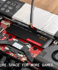 SN7100 1TB NVMe SSD Gen4 PCIe M2 2280 installed inside a gaming laptop for high octane on-the-go storage.