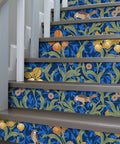 Vintage Bird Peel and Stick Wallpaper in Blue Floral Pattern on staircase steps, removable renter-friendly vinyl contact paper.