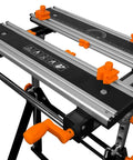 Height Adjustable Tilting Steel Work Bench With Vise 24 Inch Table Extends From 24 By 11.75 To 24 By 19 showing clamps