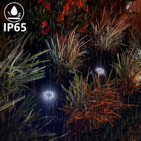 Upgraded Solar Ground Lights Eight Pack Super Bright Outdoor In Ground Garden Lights Waterproof Landscape Lights For Yard Pathway Lawn Patio Deck Walkway Cool White Beam illuminating garden in rain