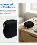 Hearing Aid Case With Travel Pouch And Battery Holder, waterproof EVA storage on desk with dimensions and glasses nearby
