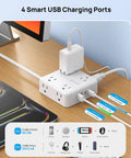 Hella Spaced Surge Protector Power Strip With Flat Plug Extension Cord And 5 Foot Cord Packing 8 AC outlets and 4 USB ports on desk.