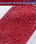 Close-up of Tough As Nails 3x5 Ft Outdoor US Flag with water droplets on red stripe, tearproof polyester, heavy duty sewn stripes.