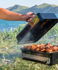 Game Changing Stainless Steel Cooking Grate And Flavorizer Bar Combo Kit Replacement For Weber Go Anywhere Portable Gas Charcoal Grill in use outdoors.