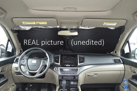 Interior view showing Retractable Windshield Sun Shade With Storage Pouch For Cars Trucks And SUVs Front Window Shield Blocker.