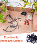All In One 1/4 Inch Drip Irrigation Fittings Kit With 130 Pieces For Garden And Lawn Tubing laid out on tiles with tools