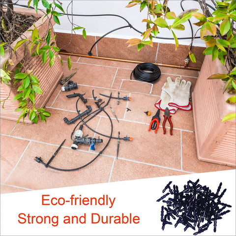 All In One 1/4 Inch Drip Irrigation Fittings Kit With 130 Pieces For Garden And Lawn Tubing laid out on tiles with tools