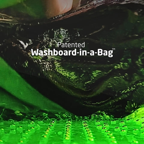 Close-up of the Pocket Friendly Travel Laundry Sack With A Built In Washboard Surface for scrubbing laundry on a textured surface.
