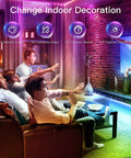 People enjoying Ultra Long 100 Feet RGB LED Strip Lights With App Control And Music Sync 5050 LED Beads in a living room setting