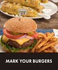 Burger with cheese, lettuce, tomato, and onions with fry side, marked with flag from 36 Piece Grill Tool Set With Spatula Fork Tongs Basting Brush Replacement Brush Heads Heat Resistant Glove 6 Stainless Steel Skewers 8 Corn Holders 10 Burger Flags Saw Tooth Grill Scraper Bottle Opener Temperature Guide Backyard BBQ Ready.