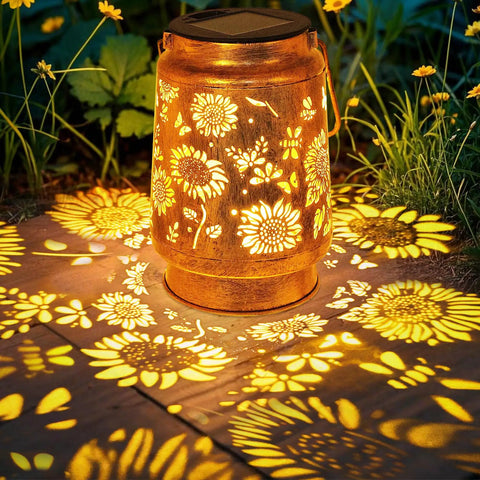 Solar Lanterns Outdoor Hanging Lights Waterproof For Yard Patio Porch Garden LED Decoration With Shepherd Hook Sunflower Pattern Cozy Warm Glow For Nighttime Ambiance Perfect Gift For Women Mom Grandma, casting floral shadows on ground.