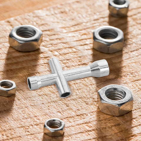 Pocket Sized Cross Socket Wrench for RC Models and Robot Repairs Tiny Nut Tool with precision fit for M2 M2.5 M3 M4 nuts on wood surface