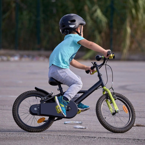 Child riding a kids bike fitted with Two Pack Bike Tubes With Bent Valve For Electric Bikes Kids Bikes And Electric Scooters Made From Butyl Rubber Delivers Superior Airtight Seal Long Lasting Air Retention Easy To Inflate Keeps Your Tire Pressure Right And Your Ride Safe on pavement