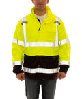 Model wearing Icon LTE High Visibility Waterproof Jacket With Attached Hood For The Jobsite, ANSI Compliant, in fluorescent yellow green and black