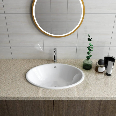 Bathroom counter with light brown granite peel and stick countertop paper, round sink, plant, and toiletries in view.