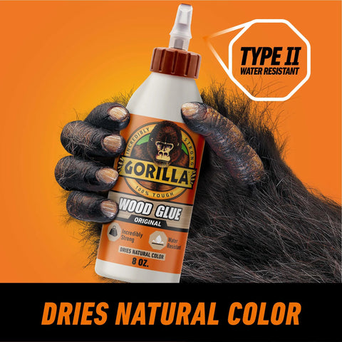 Wood Glue 8 Ounce Bottle Natural Wood Color Indoor and Outdoor Water Resistant Bond for Woodworking Projects held by hand