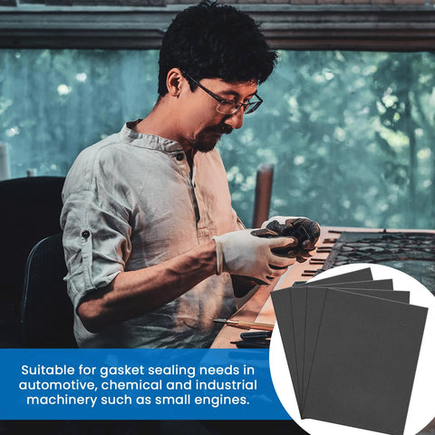 Automotive gasket sheets, dark gray, being handled by mechanic for high-temperature sealing work.