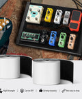 Guitar Pedalboard Mounting Tape 2M Long By 50mm Wide With Hook And Loop, pedals arranged on a board and tape rolls shown.