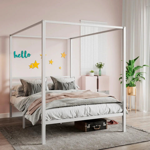 Full Size Canopy Bed Frame with Heavy Duty Metal Slats in White Four-Poster Style, styled in a cozy bedroom.