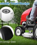Front 13x6.50-6 Flat Free Mower Tires And Wheels For Zero Turn Mowers With Smooth Tread, close-up view installed on mower