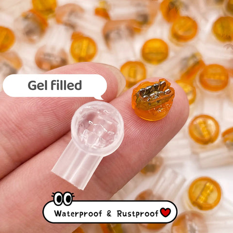 Close-up of Gel Filled Waterproof UY2 K2 Network Cable Connectors for Telephone Wire and Speaker Cable, moisture resistant.