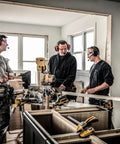 Workers using Wireless Electronic Hearing Protector With Bluetooth Technology And External Noise Canceling Boom Mic in workshop