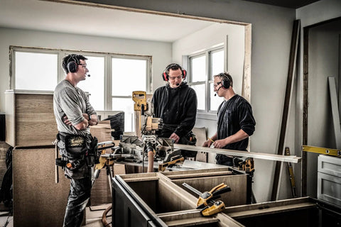 Workers using Wireless Electronic Hearing Protector With Bluetooth Technology And External Noise Canceling Boom Mic in workshop