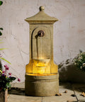 Massive Outdoor Wall Fountain With LED Lights 42.91 Inch Tall Freestanding Garden Water Feature in sandstone finish on patio