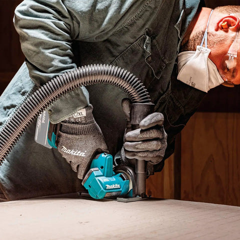 Worker using 18V LXT Brushless Cordless 3 Inch Cut Off Tool, Tool Only With One Hand Operation on wood surface, 20,000 RPM.