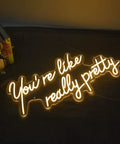You Are Like Really Pretty White LED Neon Sign For Wall Decor 28 Inches With Dimmable Switch on a dark surface