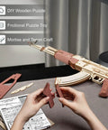 Hands assembling Dope 3D Wooden Puzzle Kit For Adults, DIY Rubber Band Gun Build on a table, focus on puzzle pieces.