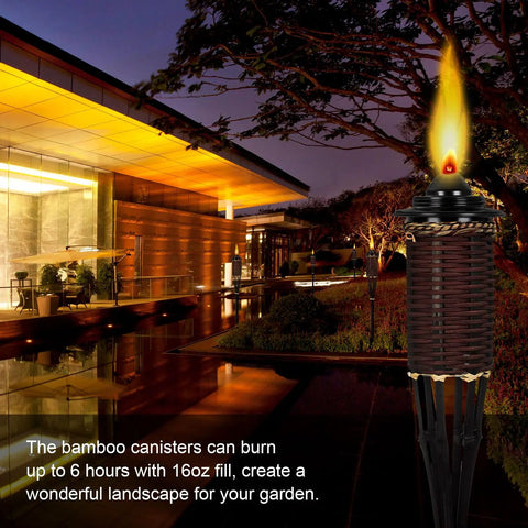 Outdoor bamboo torch lit at night next to modern house, showcasing Torch Replacement Canisters For Bamboo Lanterns, Refillable Outdoor Torches, Yard Patio Deck Garden Party Decor, 16oz 6 Pack, Easy Swap For Cozy Outdoor Vibes And Nighttime Ambience
